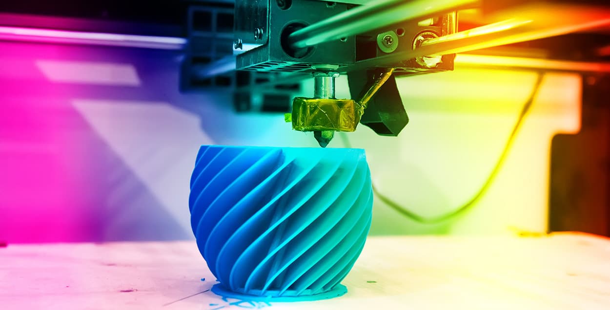 Image of a vase being 3D printed